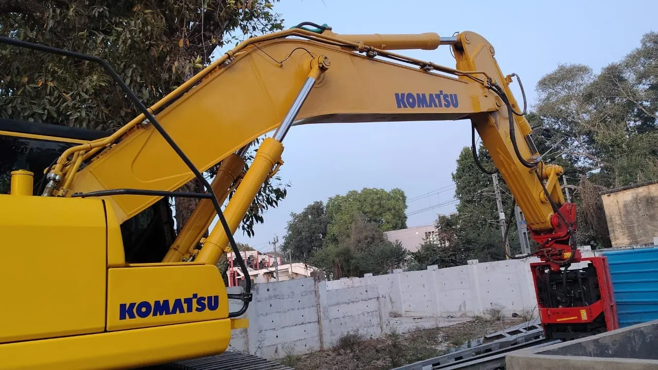 Excavator with a vibro hammer, Uttar Pradesh, 2026, infrastructure work by M/S VKJJVBBNINFRA