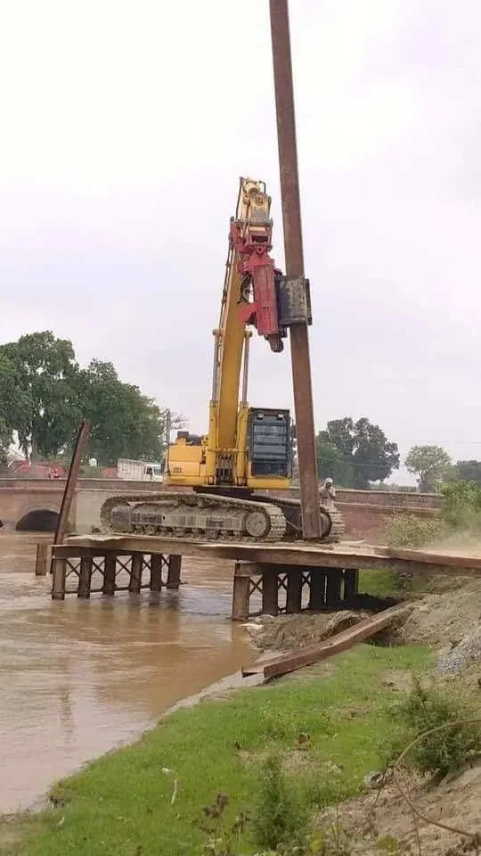 Temporary platform over a river, Uttar Pradesh, 2026, infrastructure work by M/S VKJJVBBNINFRA