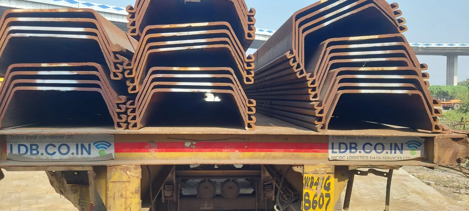 Sheet piles loaded for site, Uttar Pradesh, 2026, infrastructure work by M/S VKJJVBBNINFRA