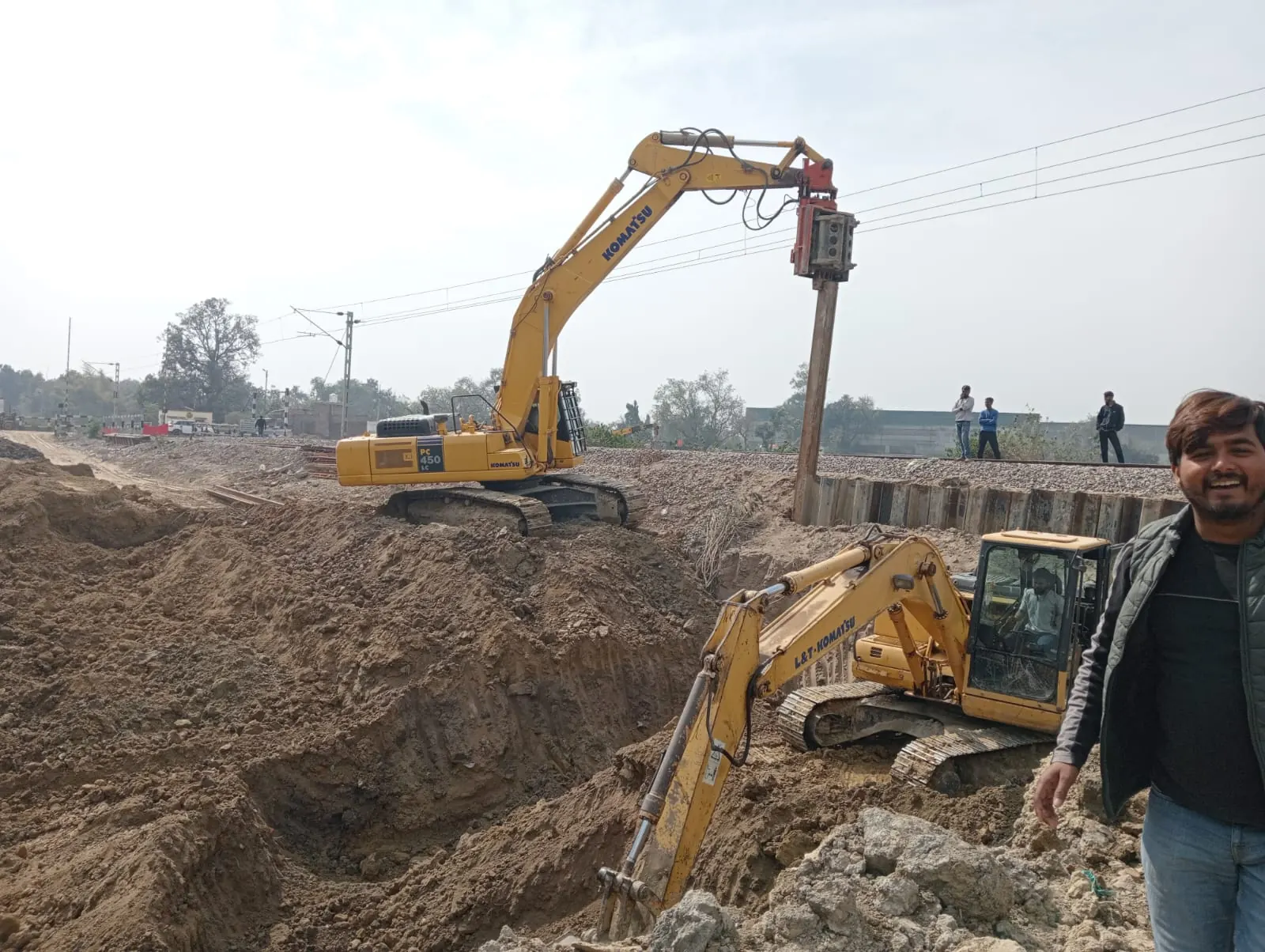 Excavation with two machines, Uttar Pradesh, 2026, infrastructure work by M/S VKJJVBBNINFRA