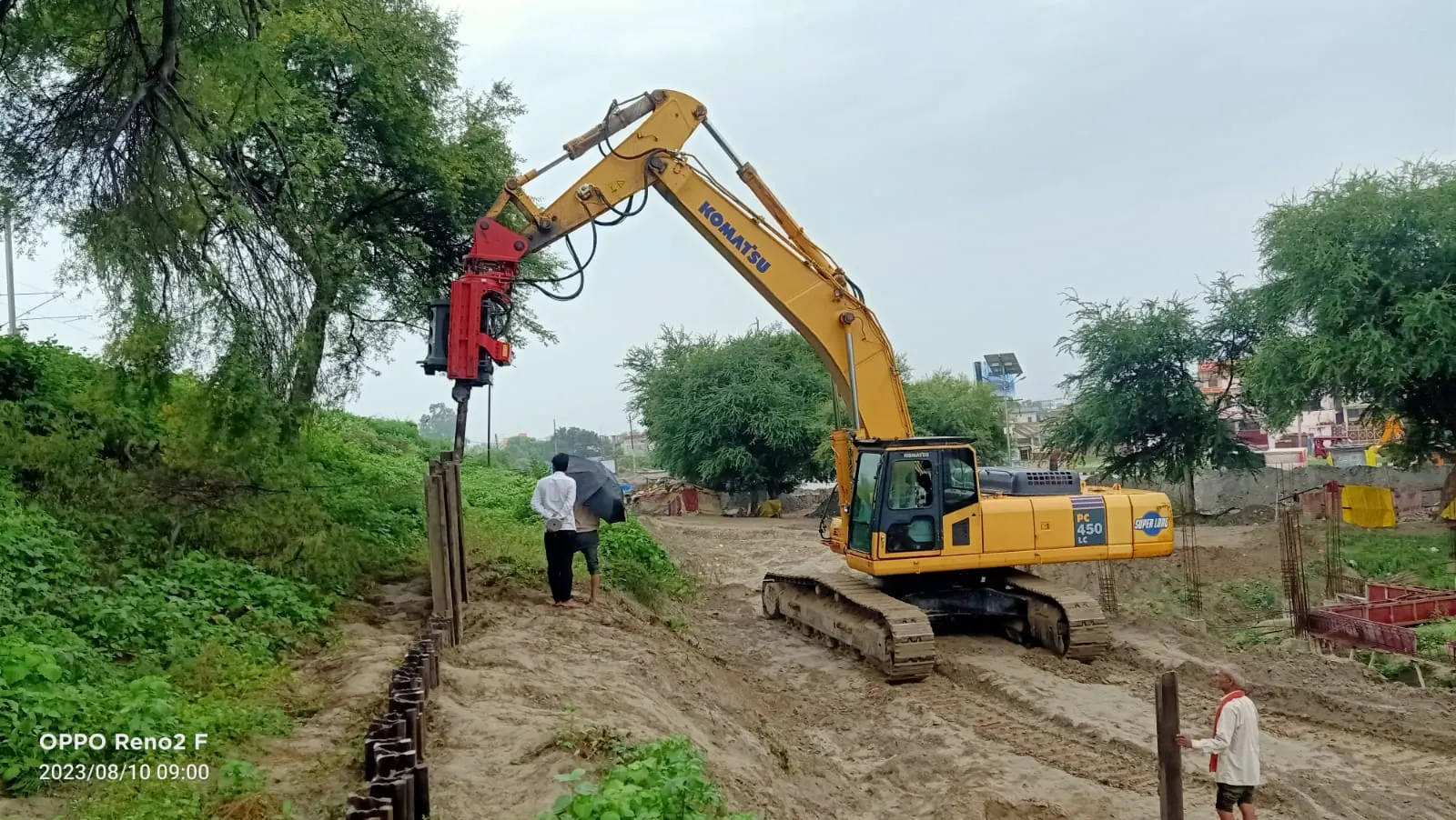 Piling along a planted edge, Uttar Pradesh, 2026, infrastructure work by M/S VKJJVBBNINFRA